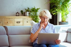 Women on laptop for public sector web accessibility